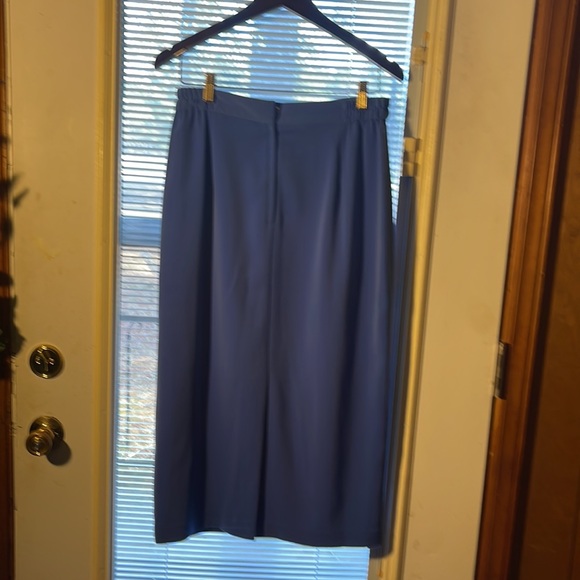 Two piece suit outfit. Size 12 with designs around collar and in front - Picture 3 of 4